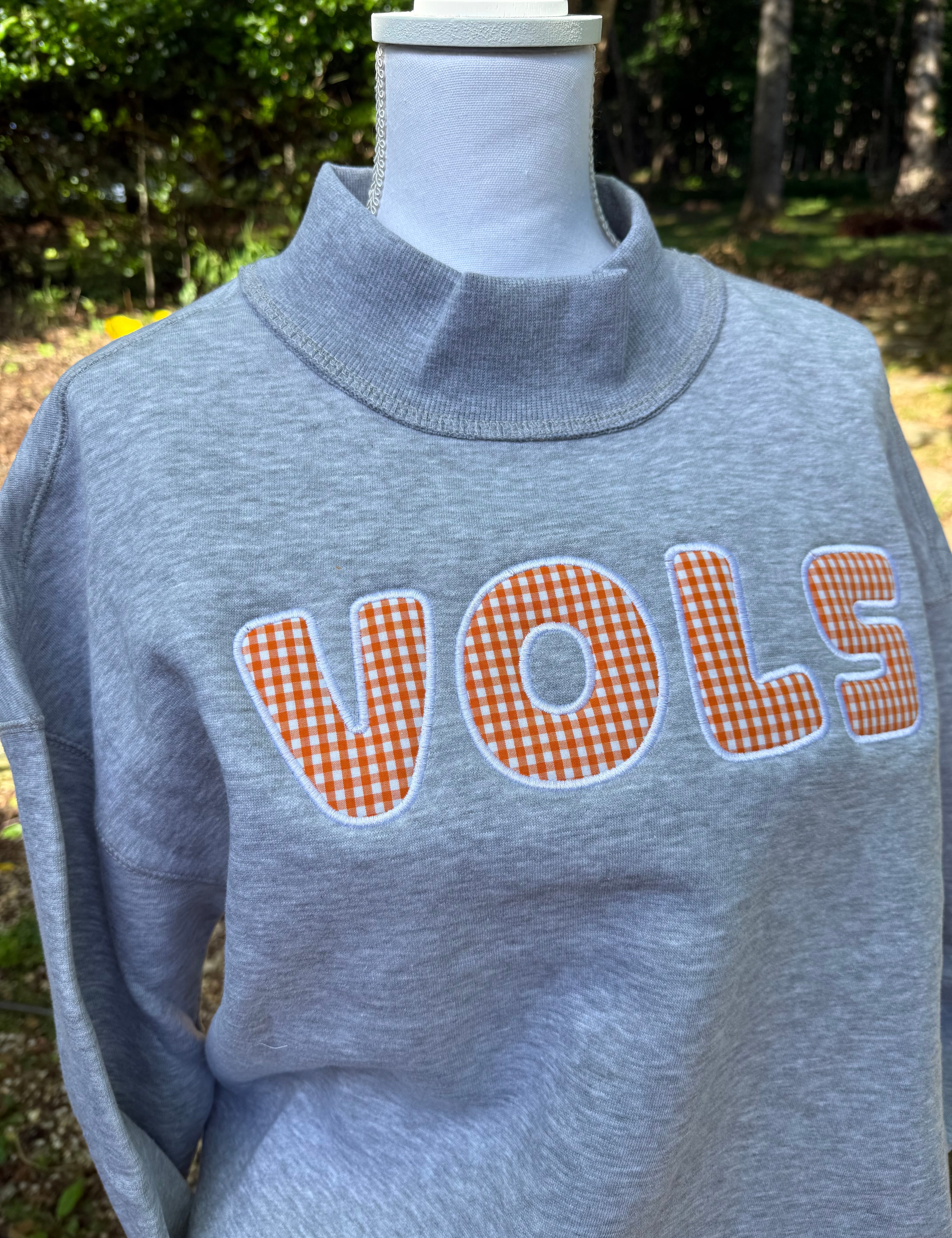 Mockneck embroidery