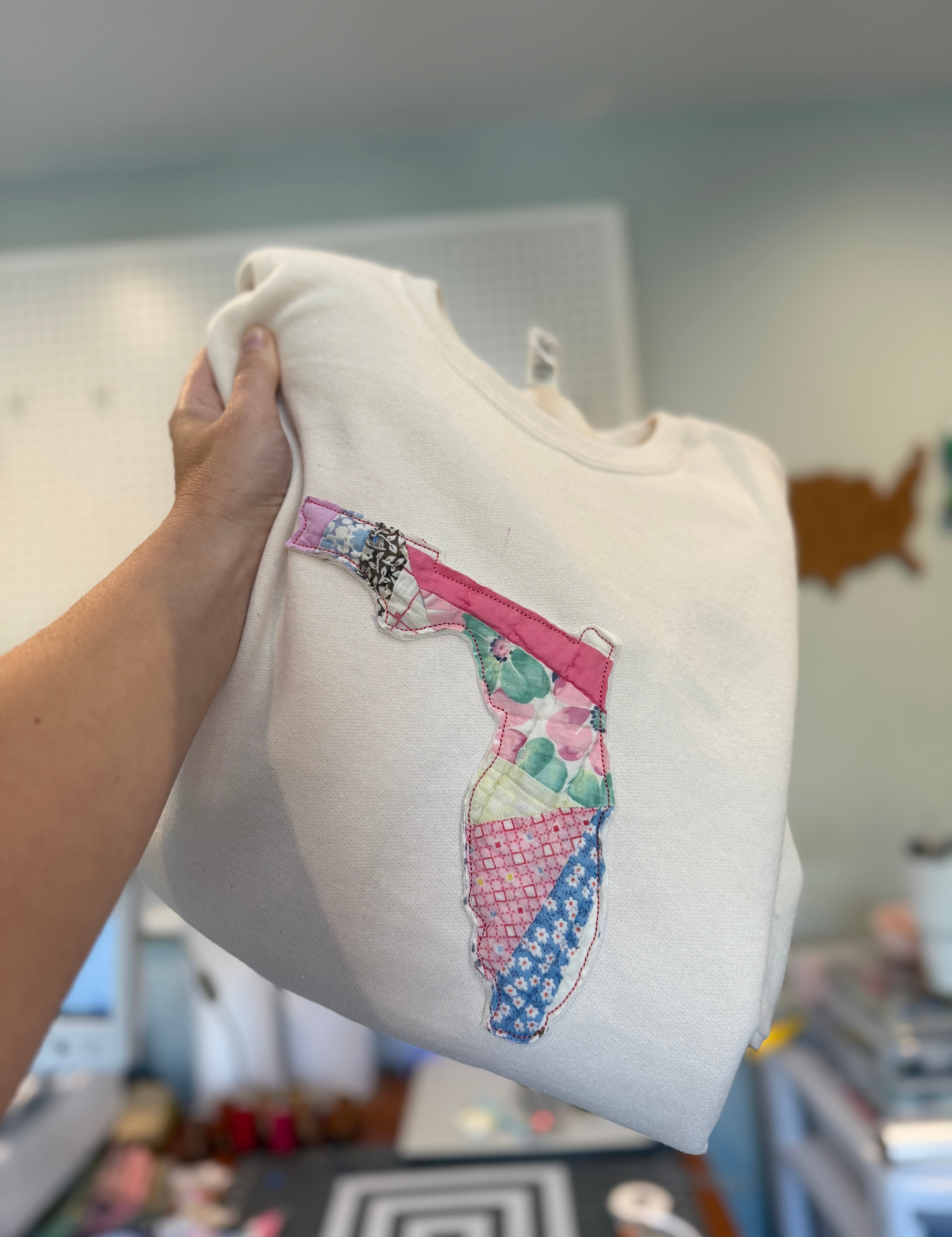 Cream sweatshirt with patchwork 