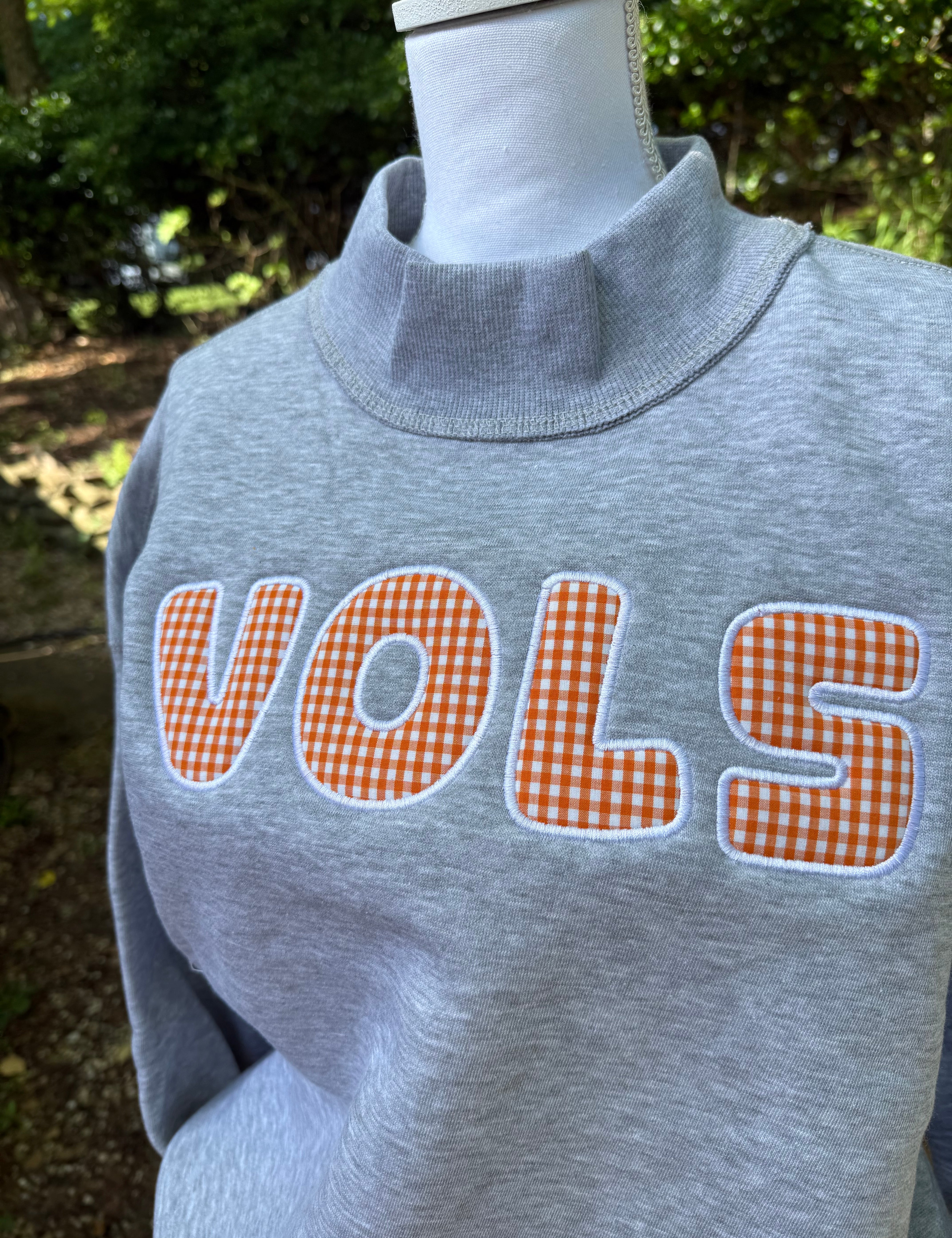 Mockneck embroidery